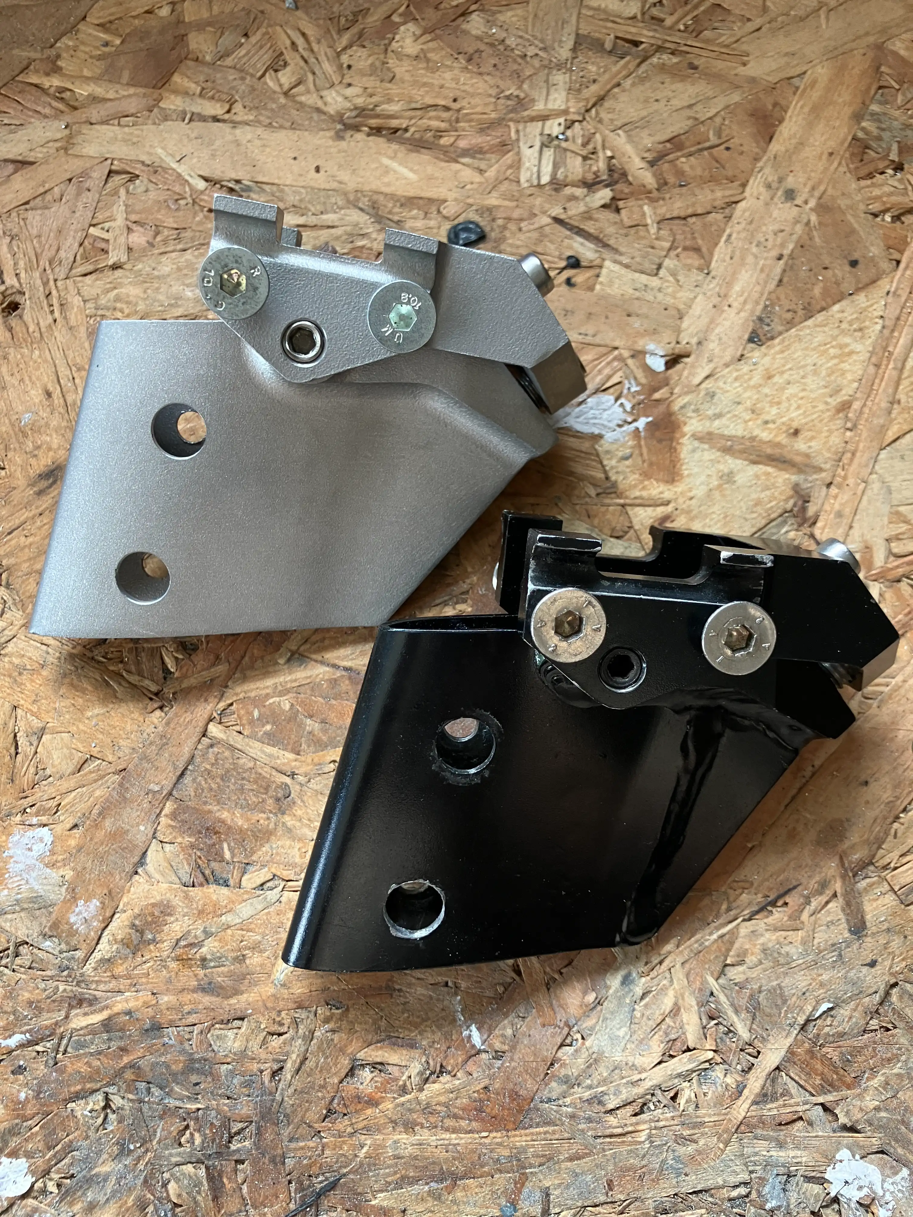 Comparison of the original Lotus 110 saddle clamp and the redesigned 3D printed version