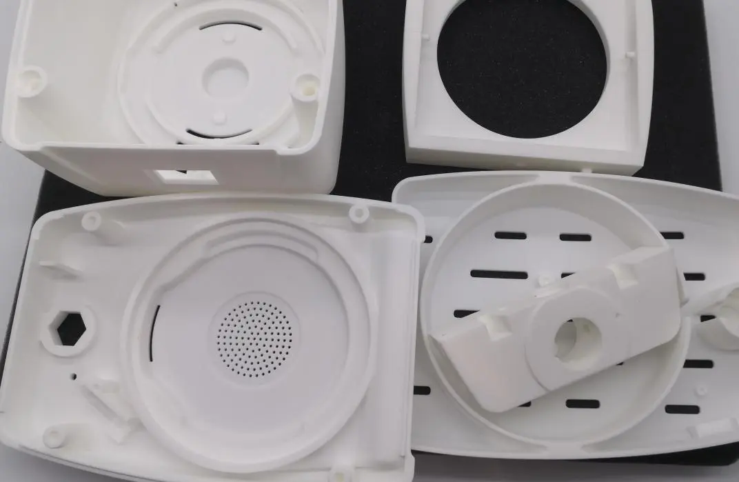 Selective Laser Sintering (SLS) 3D printed plastic parts and enclosures