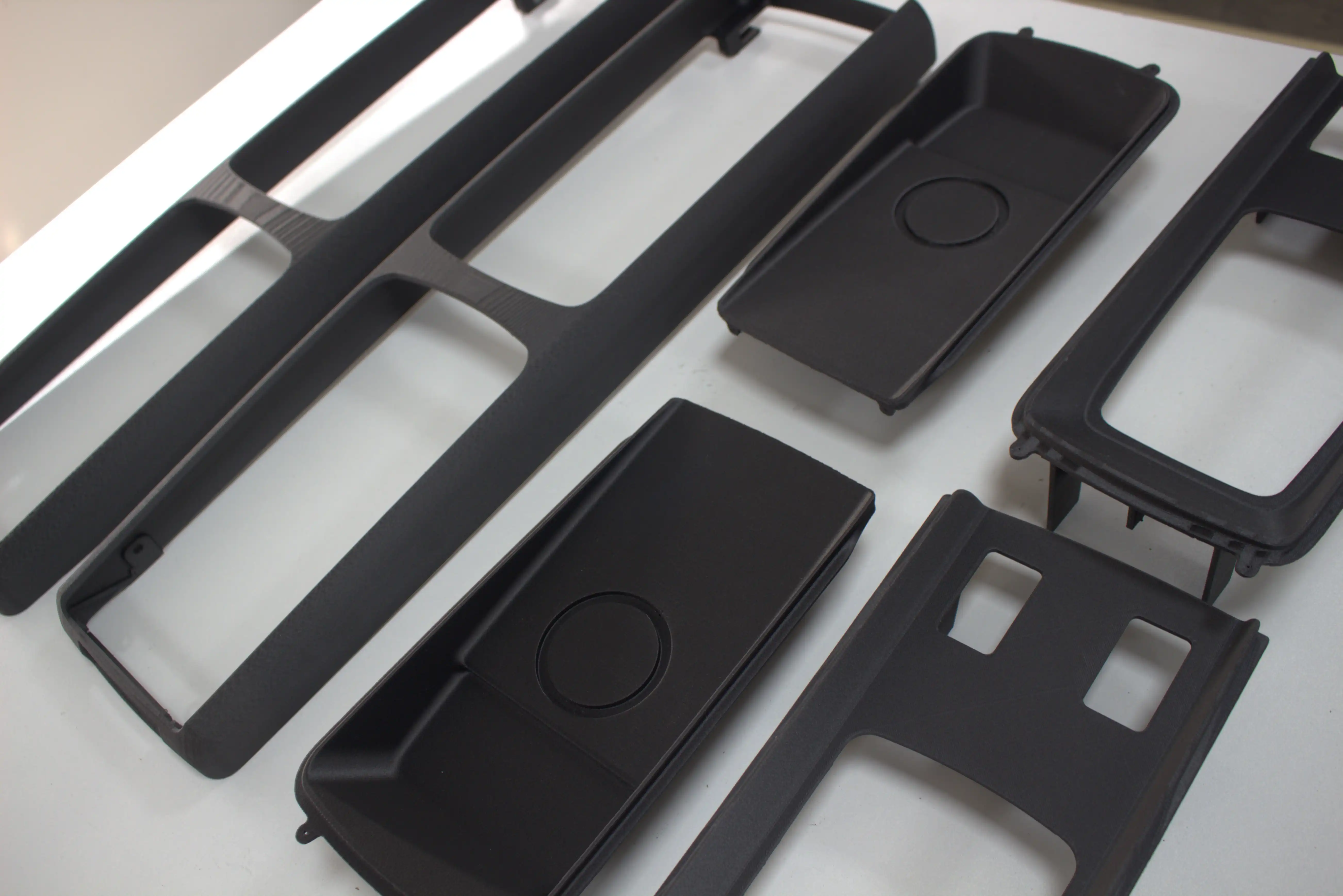 Multiple automotive interior parts manufactured with PA6-CF using FDM 3D printing