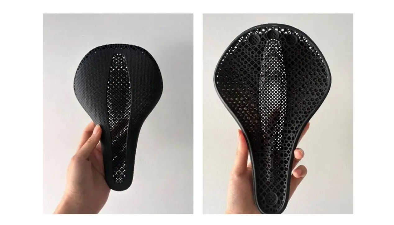 Front and back views of a finished one-piece TPU lattice bike saddle