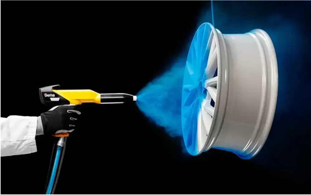 Powder coating process applying blue powder to an aluminum wheel