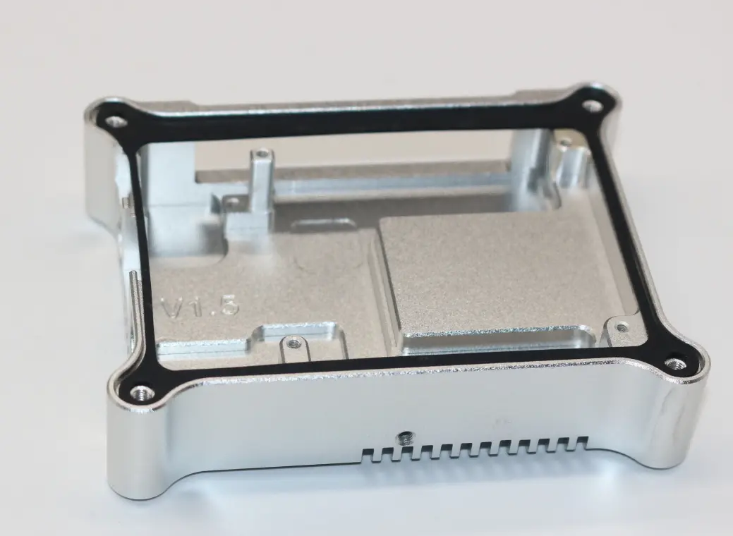 Alodine-coated aluminum enclosure with precision machined features