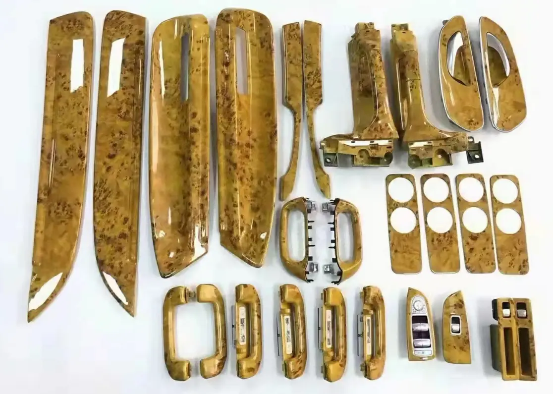 Electroplated automotive interior parts with gold-colored surface finish