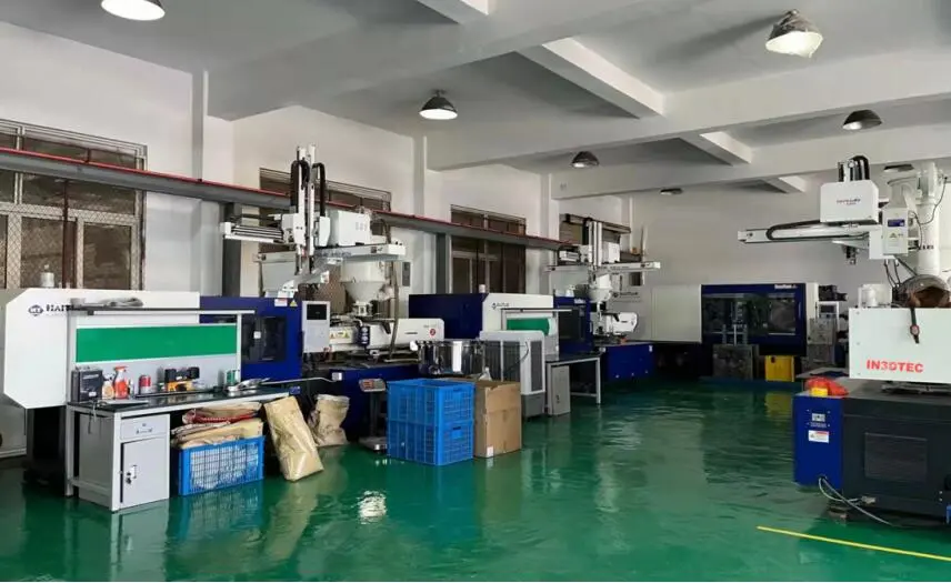 Injection molding machines and production equipment inside the IN3DTEC manufacturing facility