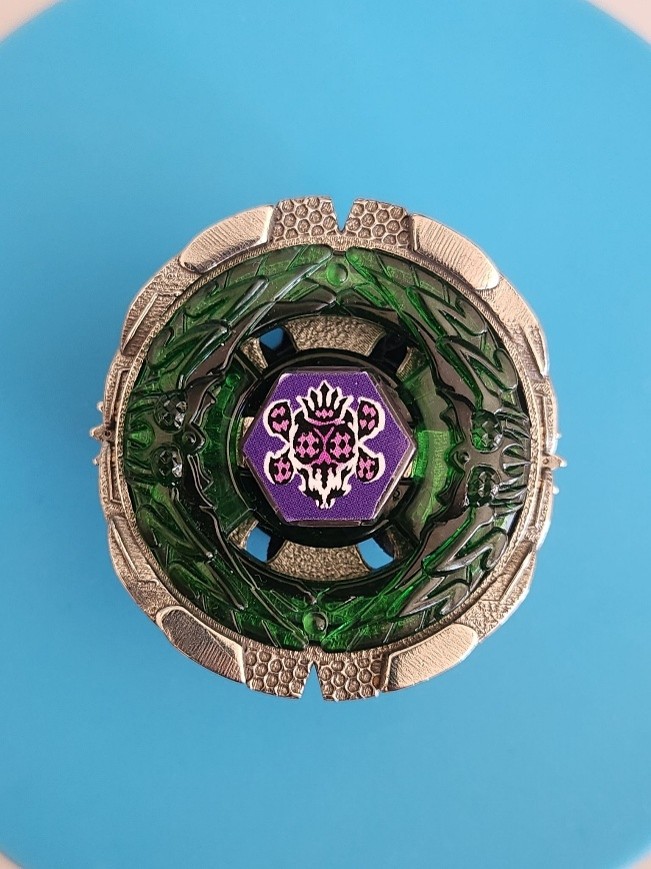 Finished custom 3D printed Beyblade Blasphemous Beelzeb with a metal base.